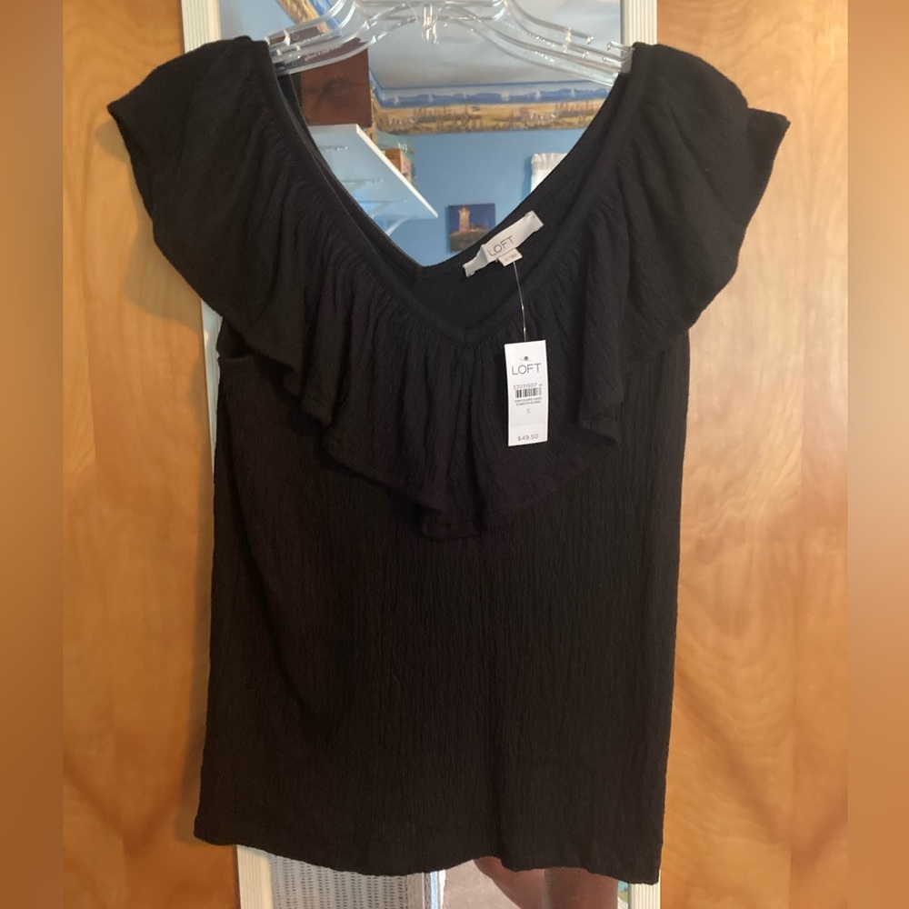 Loft black sleeveless shirt. NWT !!